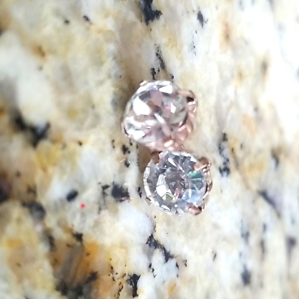Large gold tone studs